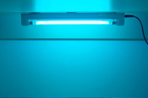 An illustration of the benefits of installing a UV light system in a home, including improved air quality, reduced allergens, reduced bacteria, and improved HVAC system performance.